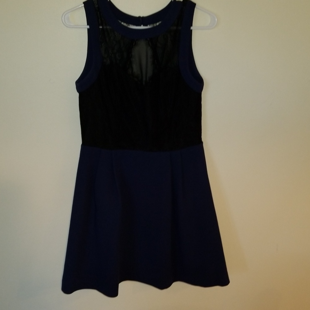 BCBG blue dress with black lace details.
